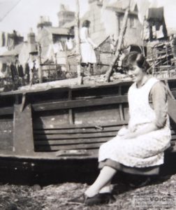 Washing out behind Mill Terrace, with Daisy Pitman in boat